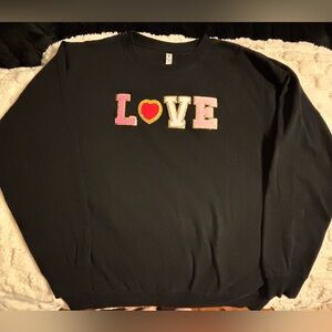 Chic Black Love Sweater with Colorful Accents